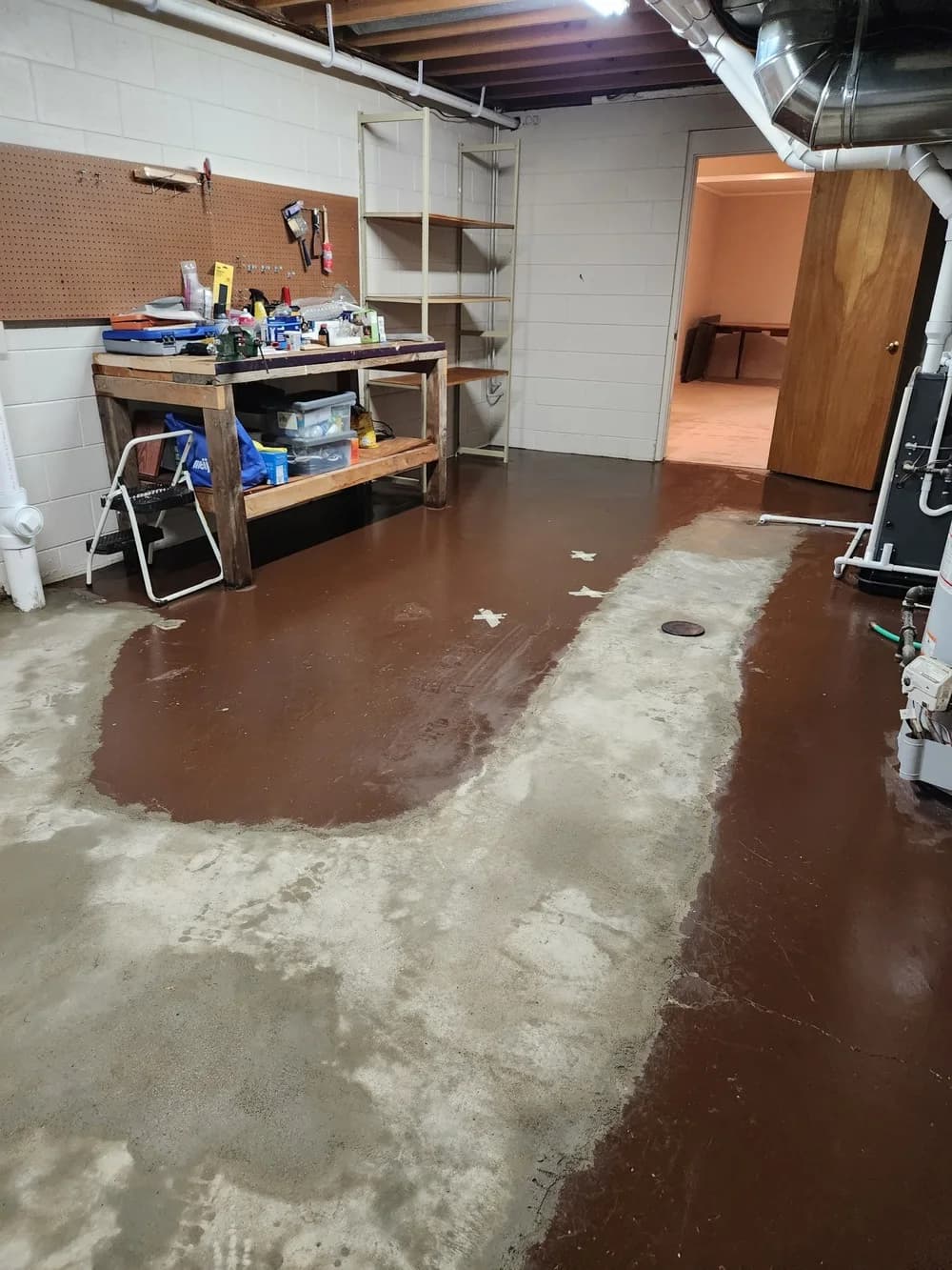 Commercial floor mid-strip, half bare and half under old finish