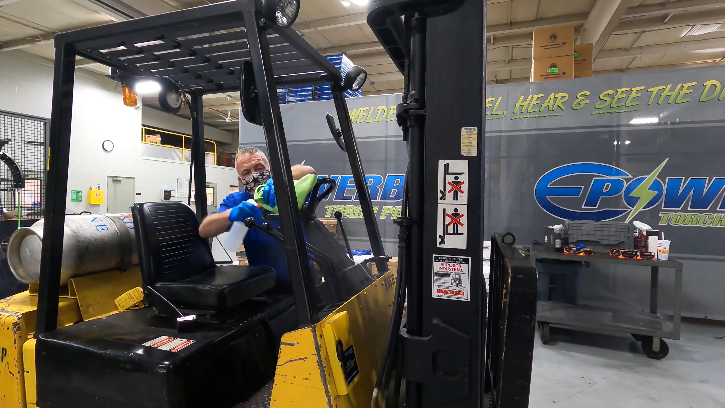 SWAT crew working a commercial warehouse floor between racking